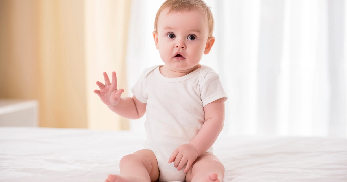 baby wearing the organic baby clothes in india